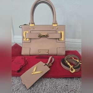 Valentino Garavani Leather Handbag with Gold Accents